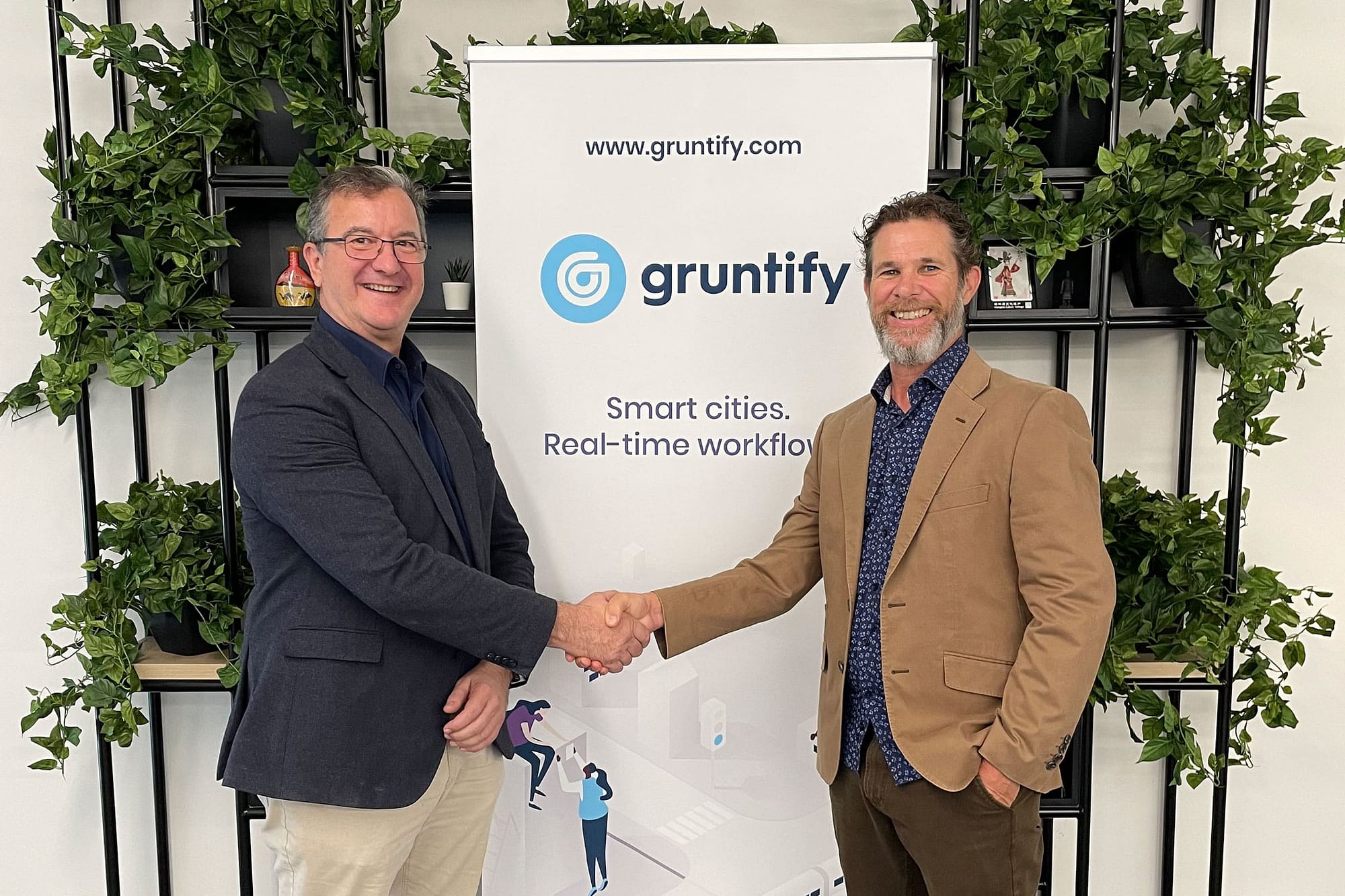 gruntify hc solutions partners shaking hands